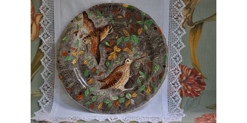 Assiette en faïence de Gien à décor d'oiseaux